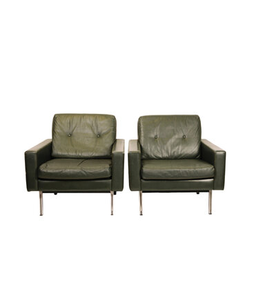 Groene leren vintage fauteuils